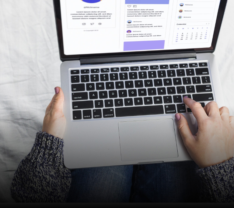 person-using-laptop-bed-1 person-using-laptop-bed-1